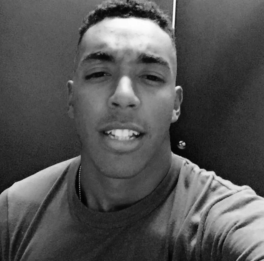 Gianni Green Shirt Blue Background BW